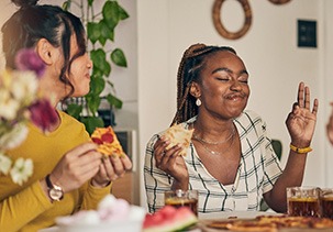 Group of friends enjoying meal together