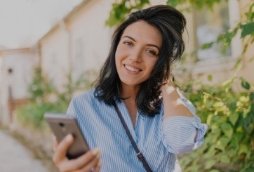 Woman with healthy smile after periodontal thearpy