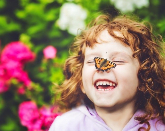 Little girl smiling after children's dentistry visit