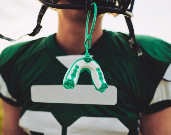 Sportsguard hanging from football helmet