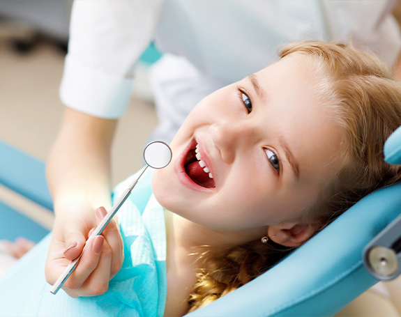 Patient receiving fluoride treatment