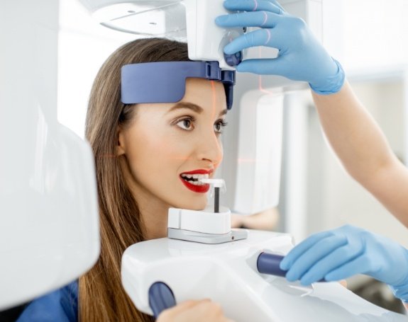 Patient receiving 3 D C T cone beam x-ray scans