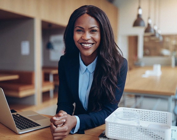 Businesswoman smiling with veneers in Chardon